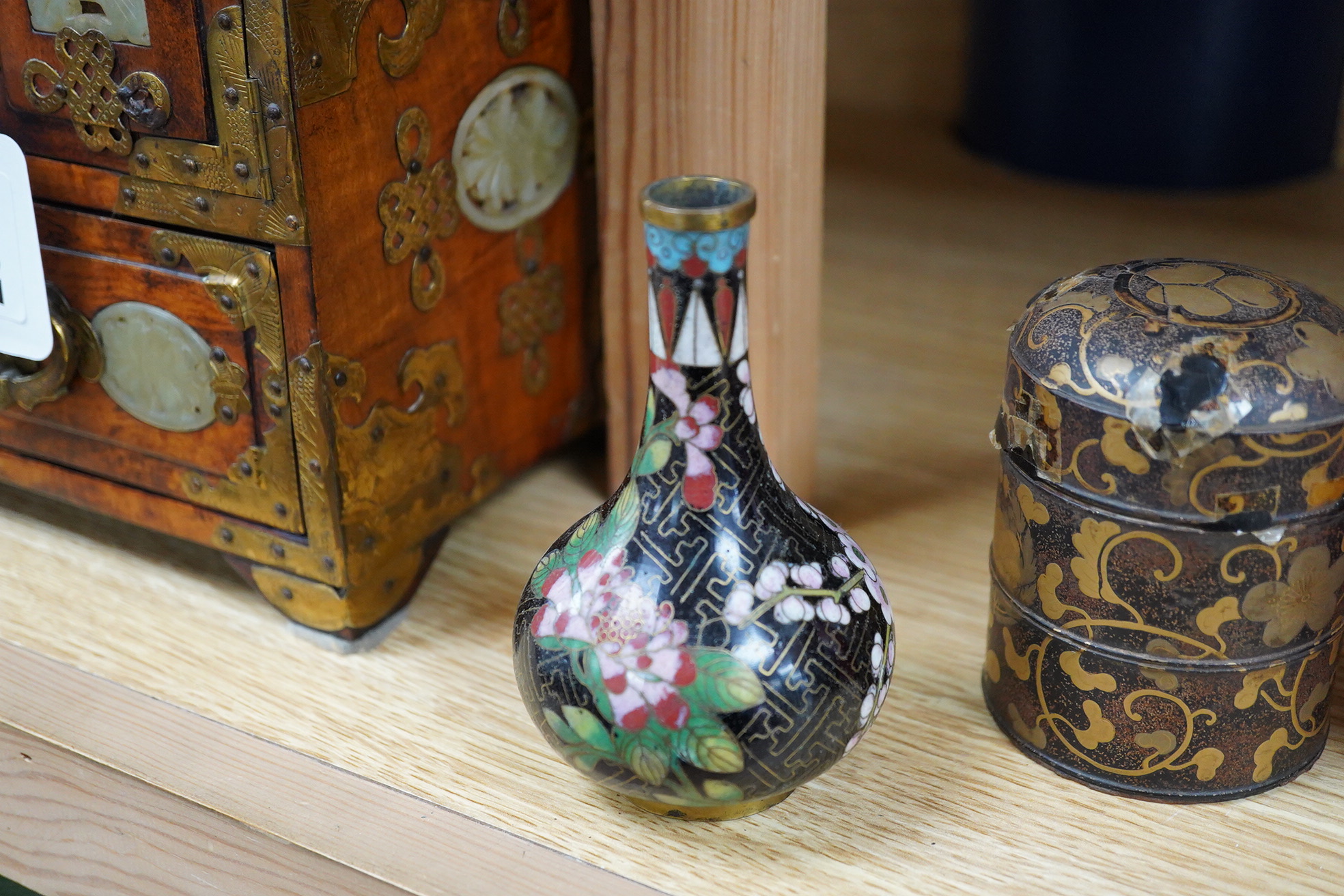A pair of Chinese cloisonné enamel vases, a soapstone seal, an 18th century Japanese lacquer box and a wood figure of Shou Lao, tallest 19cm